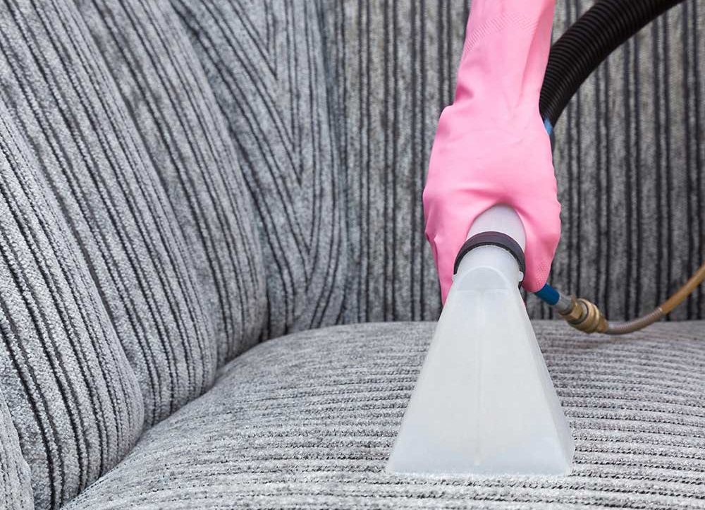 cleaning upholstery with a vacuum
