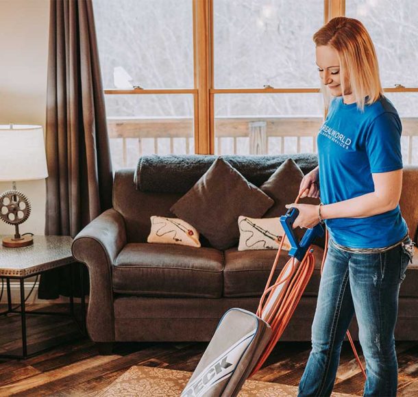 woman vacuuming the floor